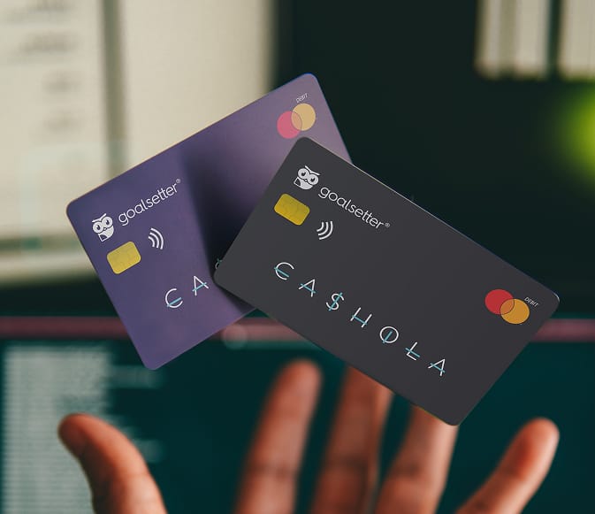 goalsetter debit card hand inthe air mockup 1