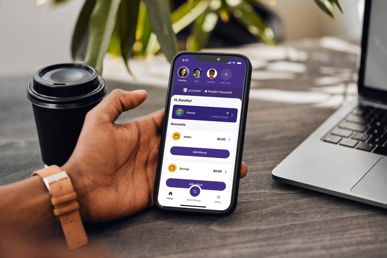 hand holding phone goalsetter screen